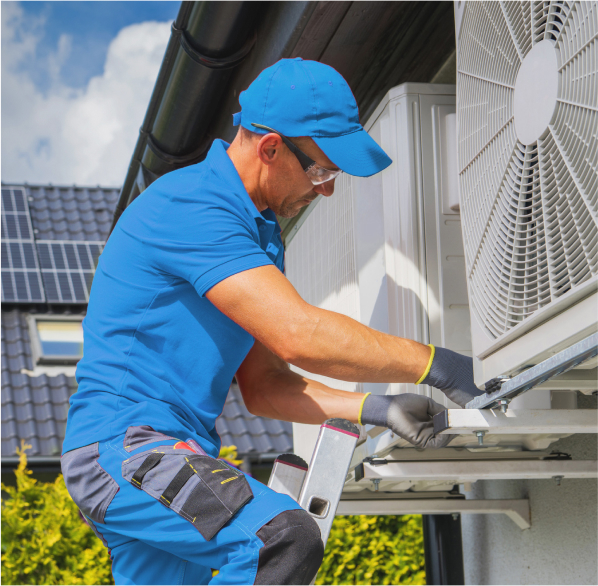 aircon technician working on an install